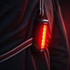 LUMEFIT rear red LED safety light attached to reflective running chest harness
